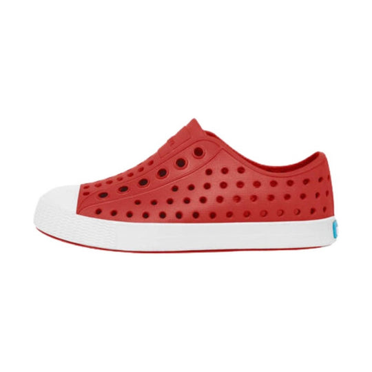 Red slip-on sneaker with perforated side panels, white sole, and a small blue heel tab