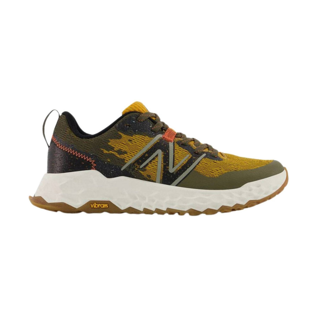 Olive, black, and gold trail running shoe with a white midsole and gum outsole