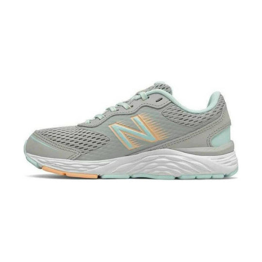 Gray mesh athletic sneaker with mint accents, orange side logo, and thick white sole.