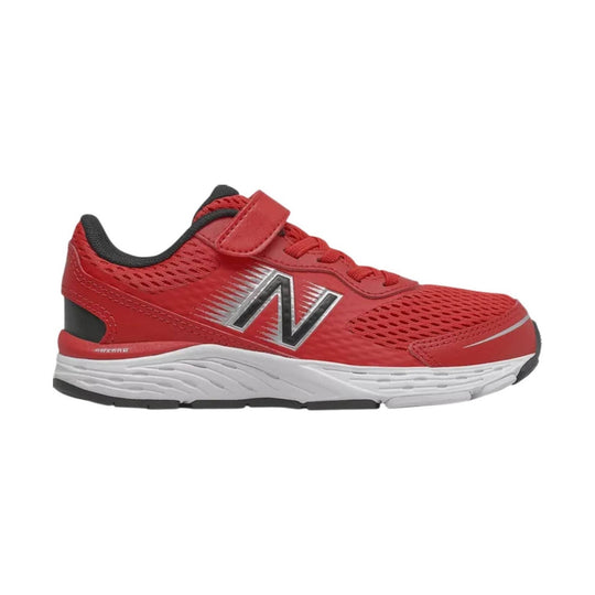 Red kids' athletic sneaker with black trim, white midsole, mesh upper, and hook-and-loop strap