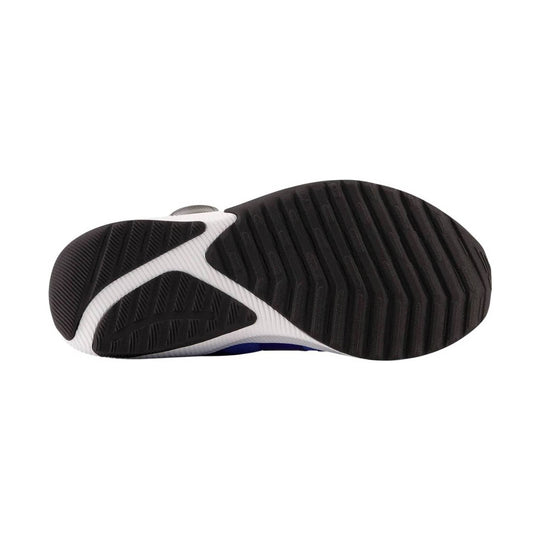 Black and white shoe outsole with ribbed tread pattern