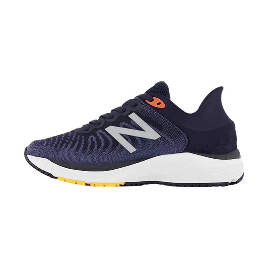Navy and white running shoe with black laces, silver side logo, and orange heel accent