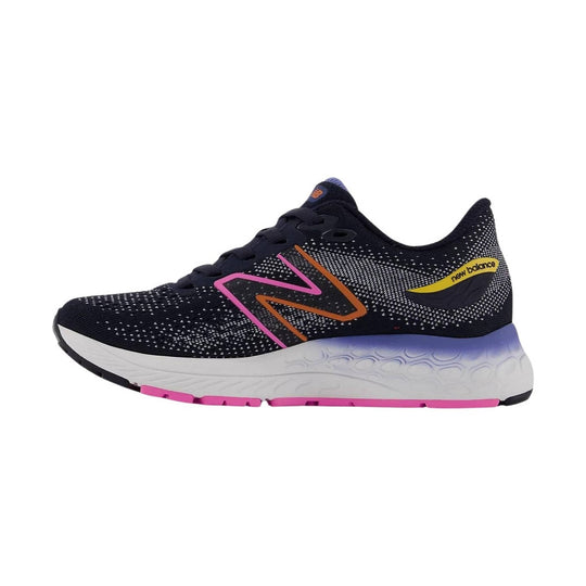 Black running shoe with white speckled knit upper, pink and orange side logo, and white cushioned sole