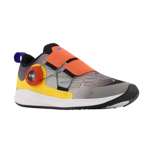 Gray kids' athletic shoe with orange straps, yellow heel accent, BOA dial, and black sole in side view