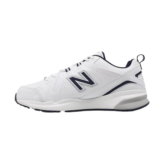 White athletic shoe with navy accents and a large side logo, shown in profile