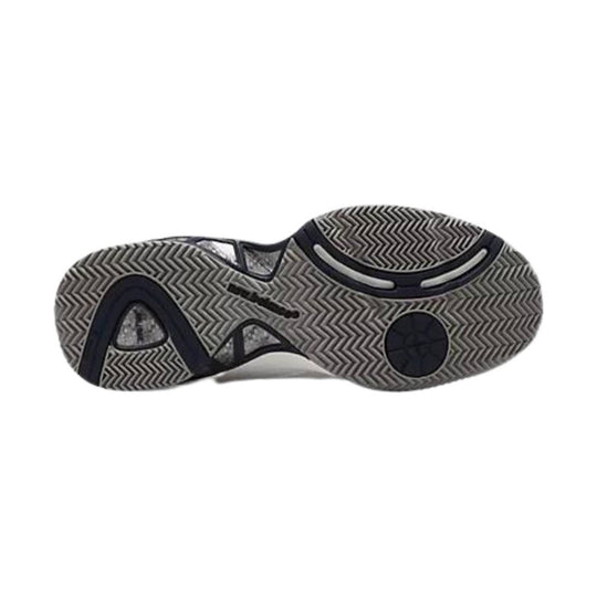 White athletic shoe sole with black zigzag tread and dark rubber support sections