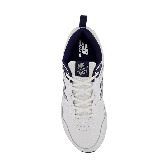 White athletic training shoe with navy trim, laces, and a padded collar, shown from above