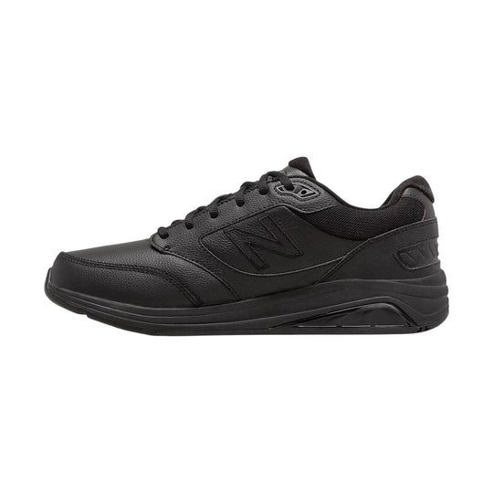 Black leather walking shoe with mesh collar, lace-up closure, and large side logo