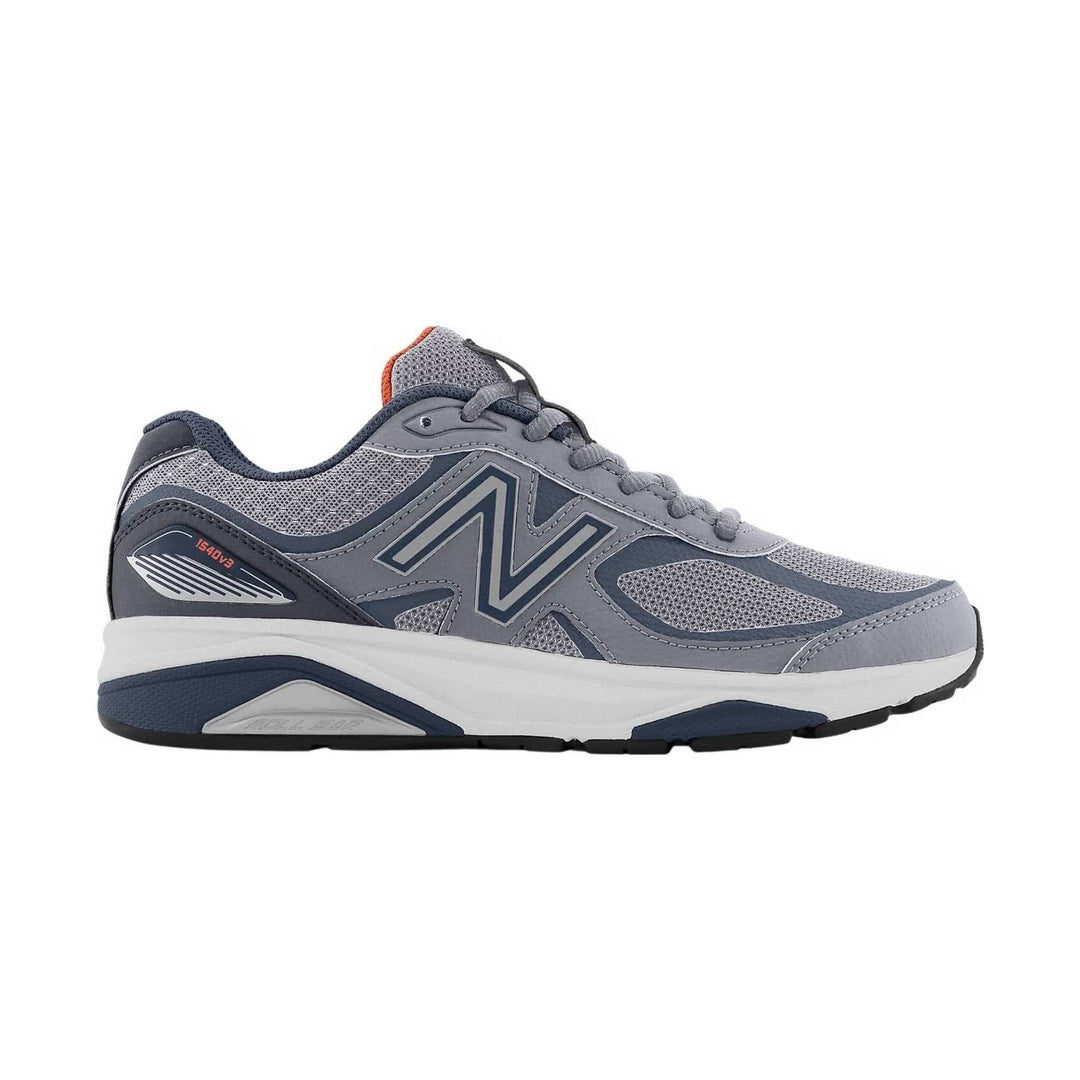 Gray and navy running shoe with mesh panels, lace-up closure, and white midsole