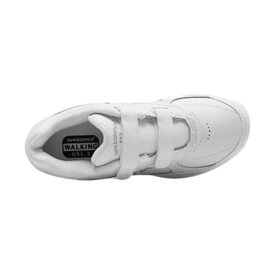 White walking sneaker with two Velcro straps and a rounded toe, shown from above