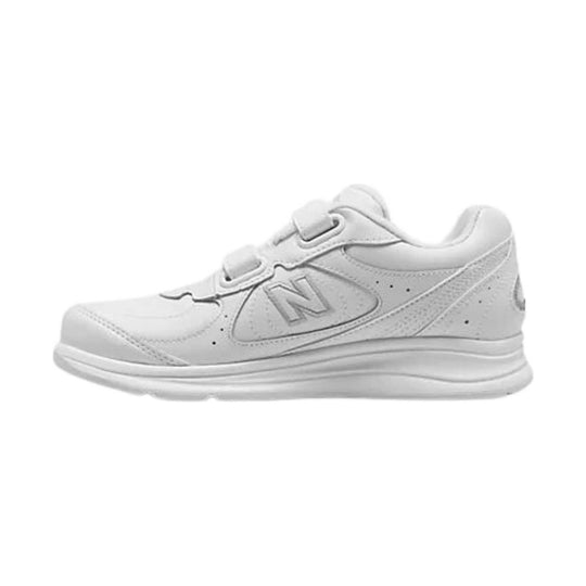 White walking sneaker with two Velcro straps and a large side logo