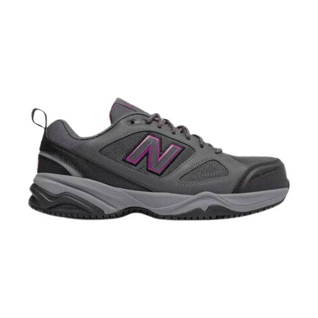 Gray low-top work shoe with black and light gray sole and magenta side logo