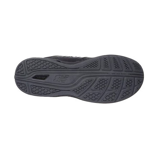 Black athletic shoe outsole with diamond tread and embossed logo