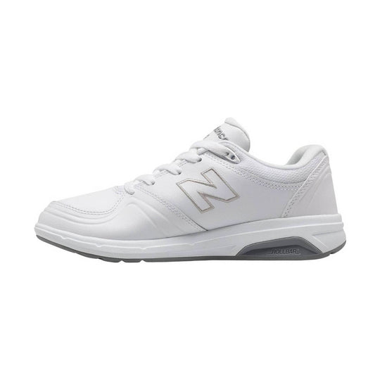 White low-top walking shoe with laces, stitched overlays, and gray sole accent