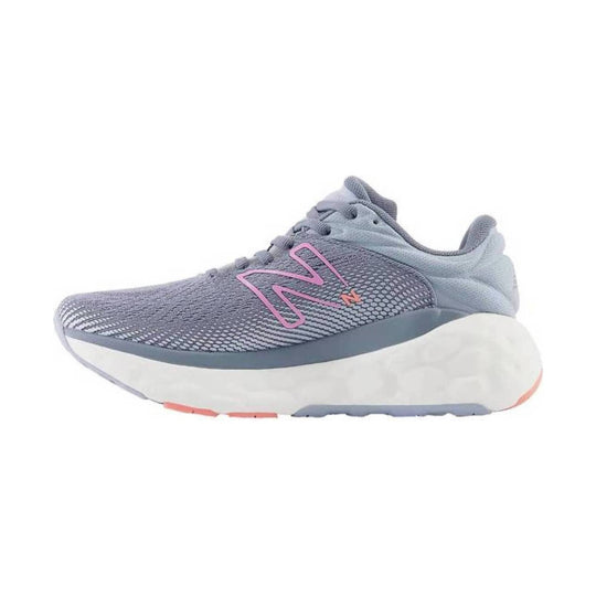 Light gray running shoe with pink N logo, white cushioned sole, and blue-gray upper