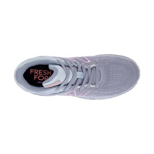 Light gray knit running shoe with pink accents and laces, shown from above.