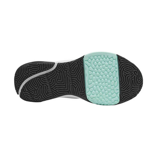 Black sneaker outsole with mint green textured midfoot section and white curved support detail