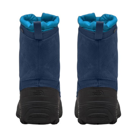 Pair of blue-and-black winter boots with teal padded collars and pull tabs, shown from the back