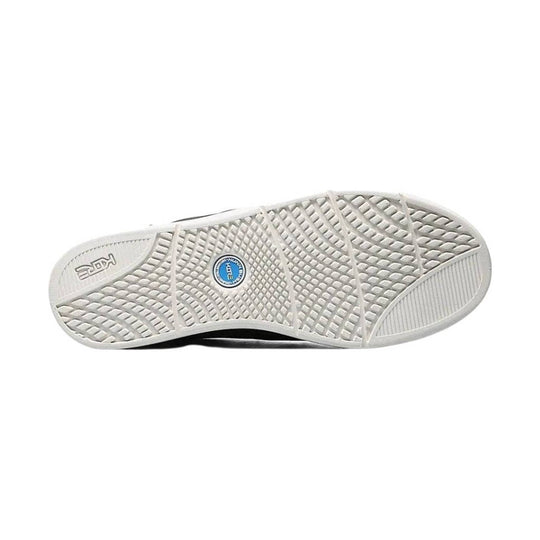 White sneaker outsole with textured tread and a blue circular logo at the center