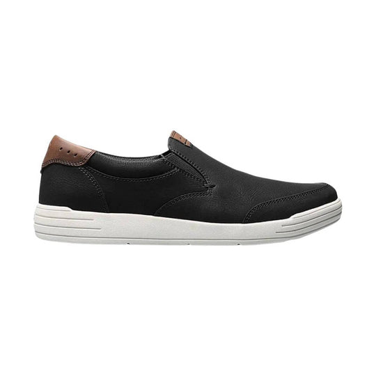 Black slip-on shoe with brown heel tab and thick white sole