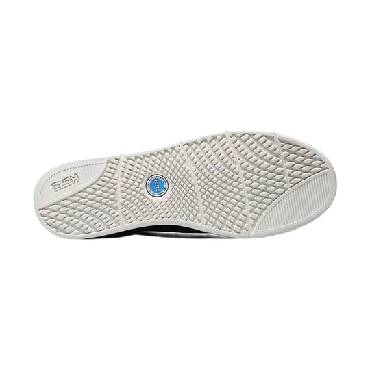 White rubber shoe sole with textured tread and a KEEN logo