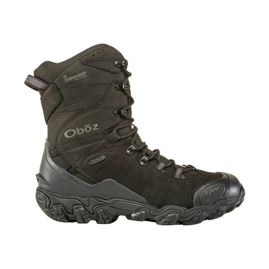 Dark insulated lace-up winter boot with lug sole and side pull tab