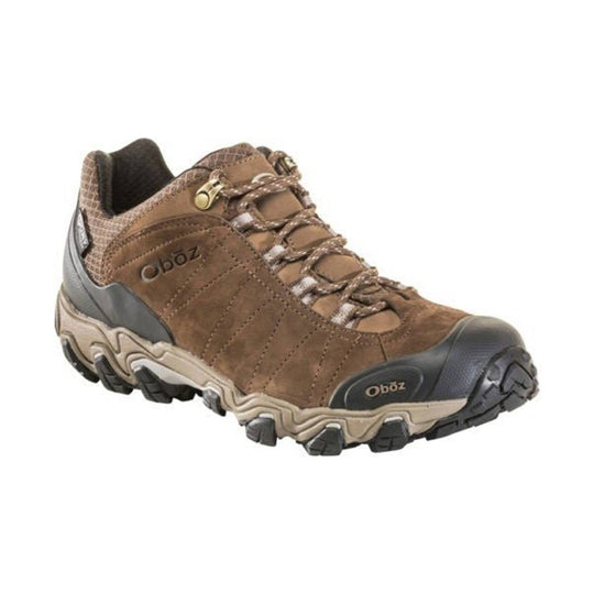 Brown low-cut hiking shoe with a suede upper, bungee laces, and a black rubber toe cap