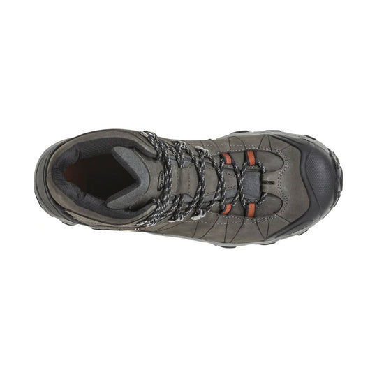 Gray mid-top hiking boot with black rubber toe cap, bungee laces, and orange lace loops