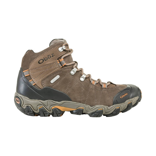 Brown mid-height hiking boot with metal lace hooks, black rubber toe cap, and rugged tread