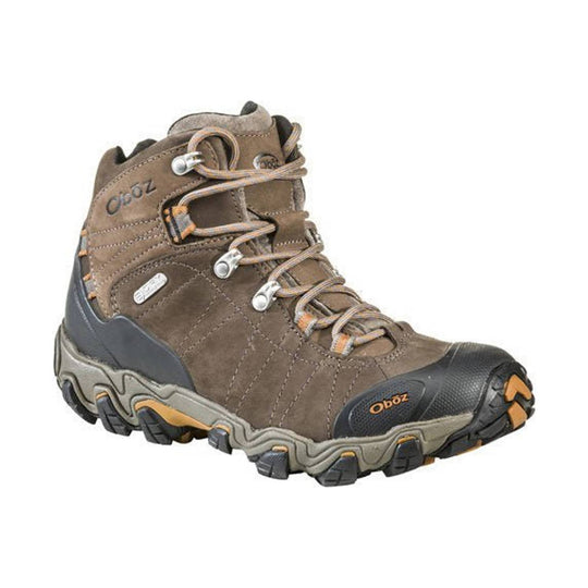 Brown mid-height hiking boot with black toe cap, metal lace hooks, and rugged lug sole