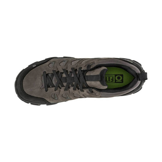 Gray low-cut hiking shoe with black laces, mesh panels, and a rugged black sole, top view
