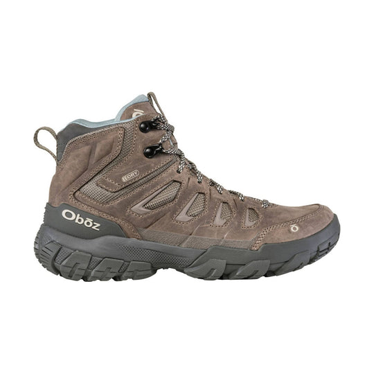 Brown mid-height hiking boot with gray sole, bungee laces, and mesh side panels