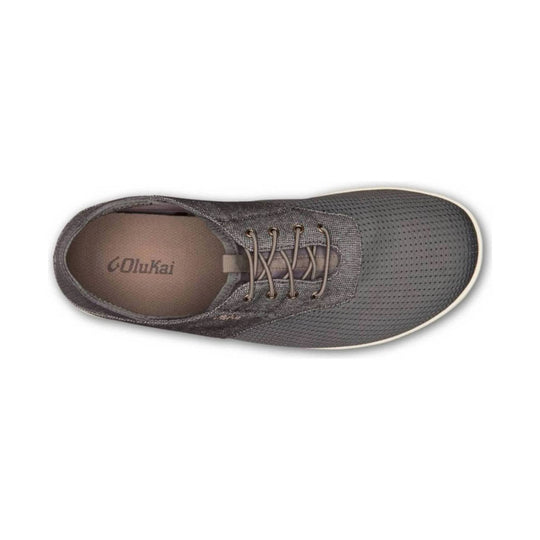 Gray lace-up shoe seen from above with perforated toe box and visible OluKai logo inside