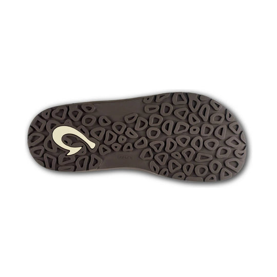 Brown sandal outsole with geometric tread and a white logo