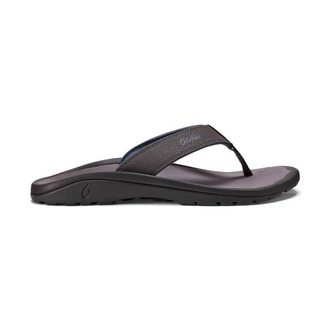Dark brown thong sandal with a cushioned black sole and embossed side logo