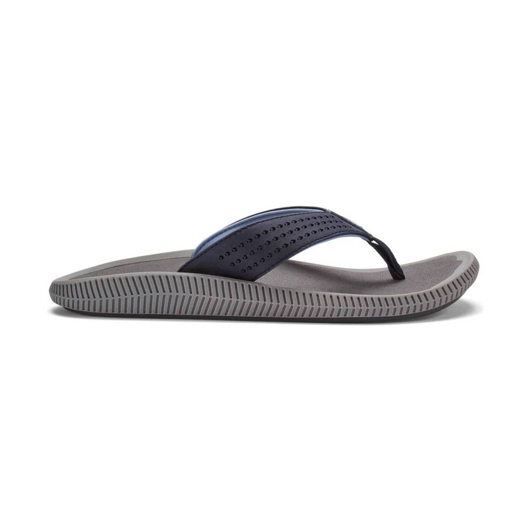 Gray flip-flop sandal with a dark perforated strap and textured sole, side view
