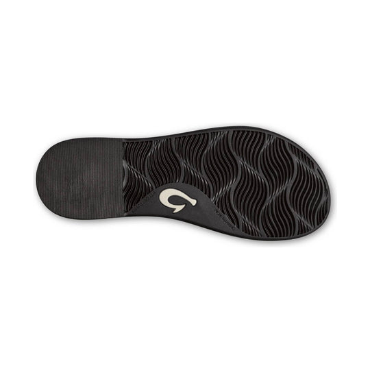 Black sandal outsole with wavy tread, ribbed heel section, and logo at the arch