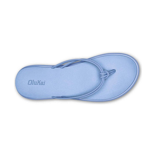 Light blue thong sandal with a toe loop and embossed Olukai logo on the footbed