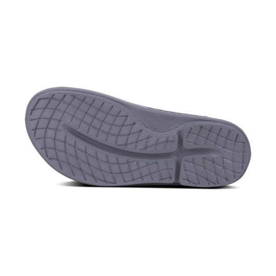 Gray rubber slide sandal outsole with tread pattern