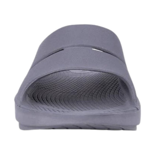 Gray slip-on sandal with a textured footbed and rounded upper opening, front view