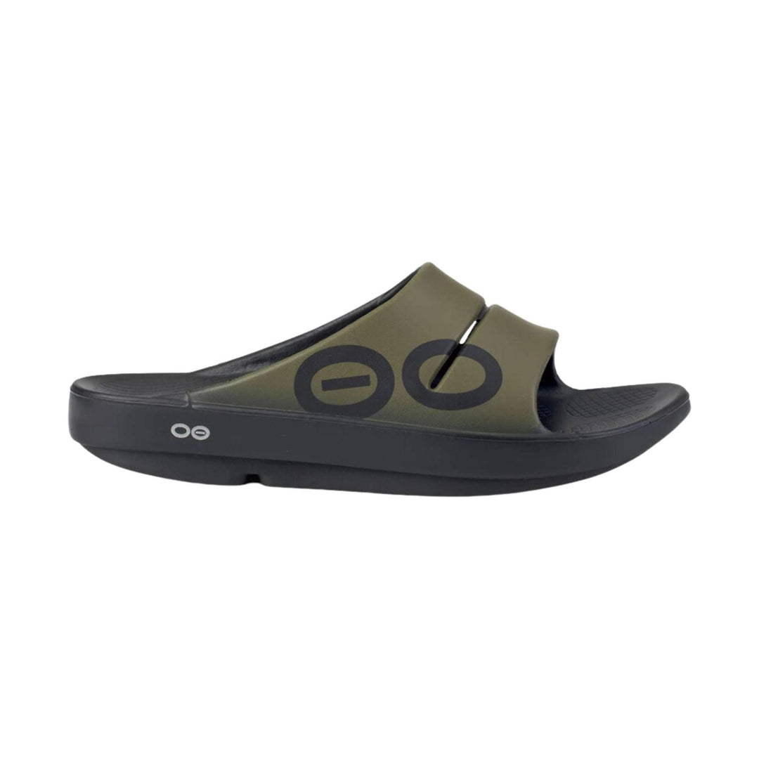 Olive and black slide sandal with a thick sole and side logo markings