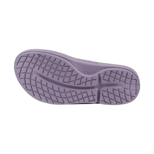 Lavender flip-flop sole with textured traction pattern