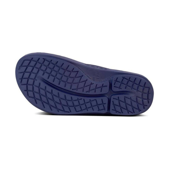Blue flip-flop sole with a gridded tread pattern