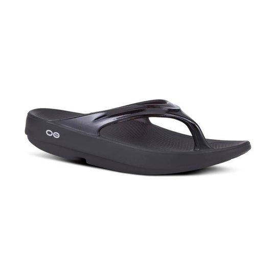 Black thong sandal with a thick cushioned platform sole and glossy Y-shaped strap