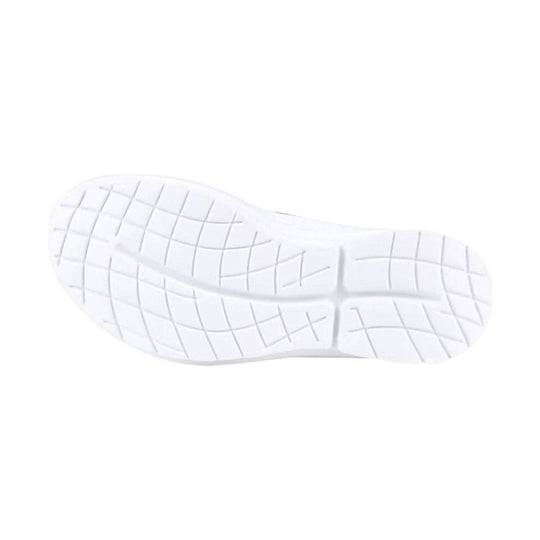 White sneaker outsole with grid tread pattern