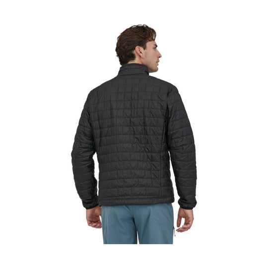 Black quilted zip-front jacket shown from the back with a stand collar and long sleeves