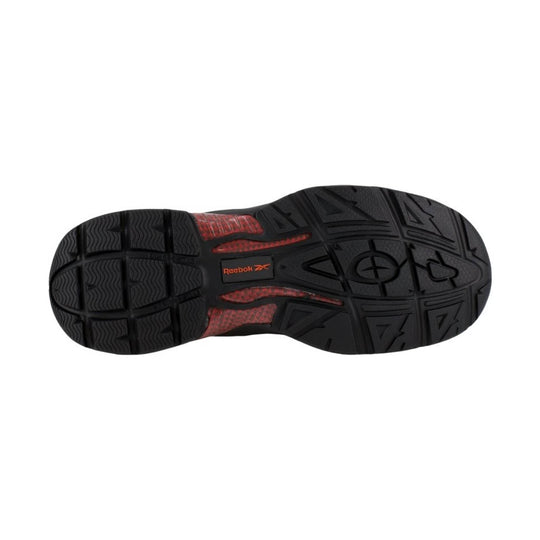 Black sneaker outsole with red textured accents and Reebok logo