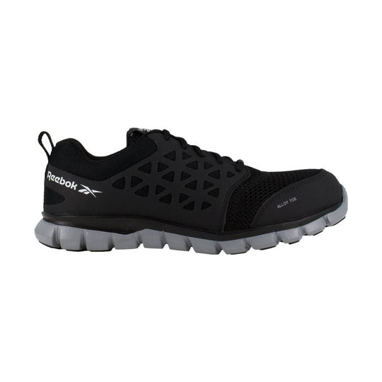 Black low-cut work shoe with mesh upper, triangular side cutouts, and a gray lug sole