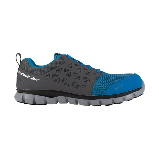Gray and blue work shoe with mesh upper, cutout side panels, and a thick lug sole