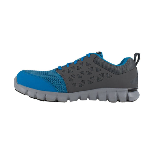 Gray and blue athletic work shoe with mesh upper, side cutouts, and a thick gray sole